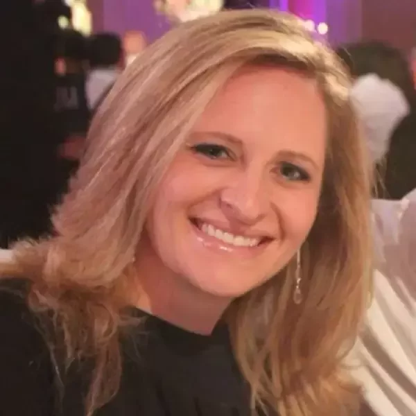 Photo of Melissa Sher, Head of Operations at Camp Simcha, sharing her experience with Hartz AI's prompt engineering course.