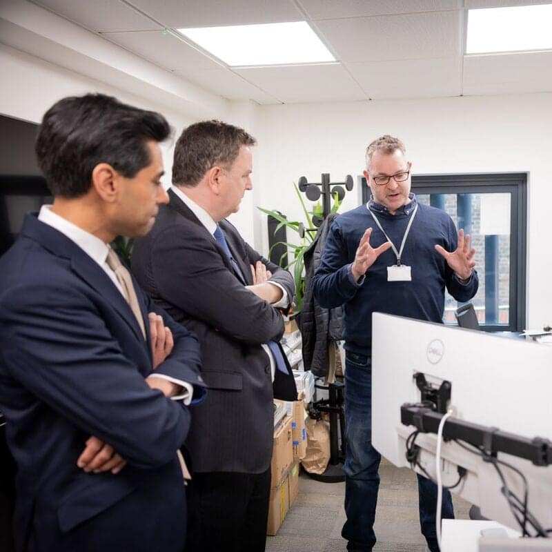 Craig Hartzel of Hartz AI demonstrates practical AI adoption for small businesses to Mel Stride MP, then Secretary of State for Work and Pensions, and Ameet Jogia MBE, then Conservative parliamentary candidate for Hendon, at the Wohl Enterprise Hub, Finchley, London.